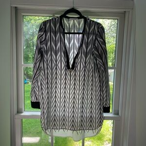 Black and white patterned Calvin Klein top.